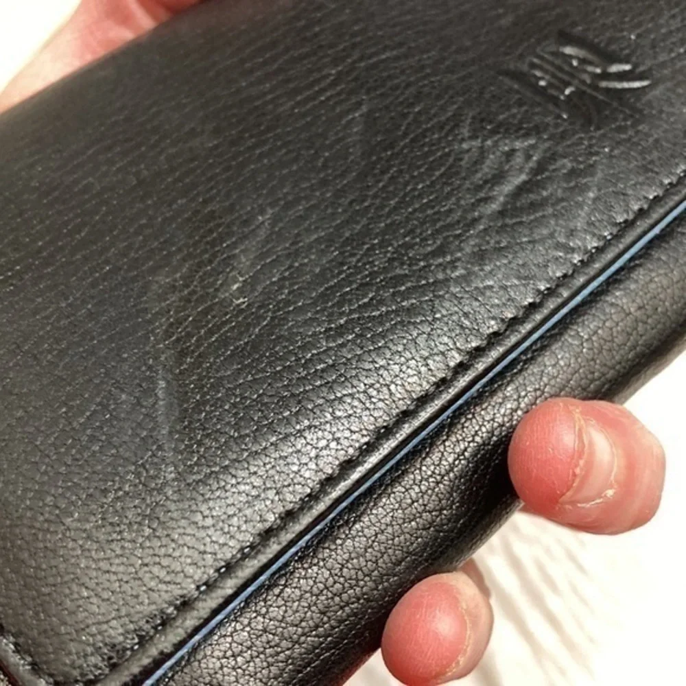 Tusk black leather wallet